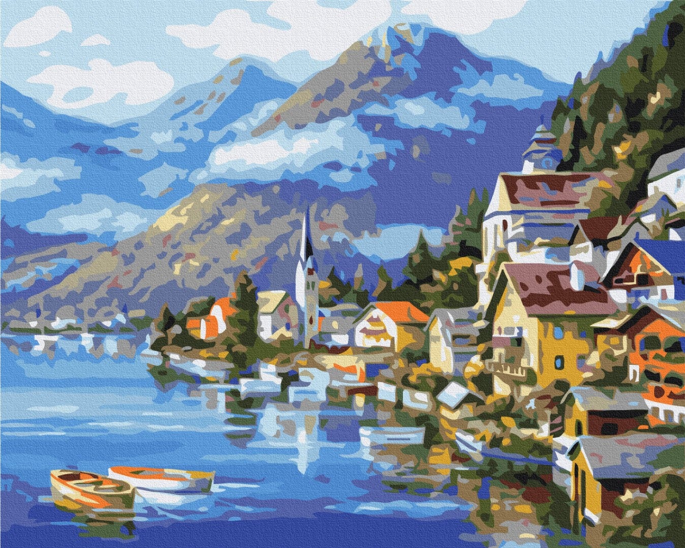 Colorful lakeside village with a church spire and small boats beneath blue alpine mountains