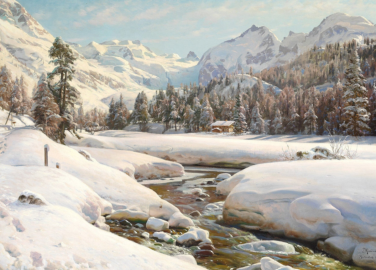 Mountain stream running between snow-covered boulders in the Alps, with a wooden hut and snow peaks beyond