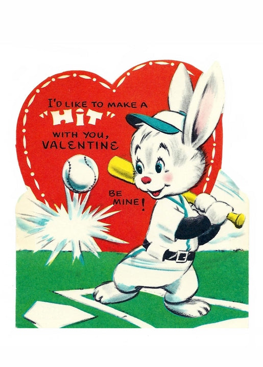 Vintage cartoon bunny in baseball uniform swinging a bat at a ball, with a 'Be Mine' heart