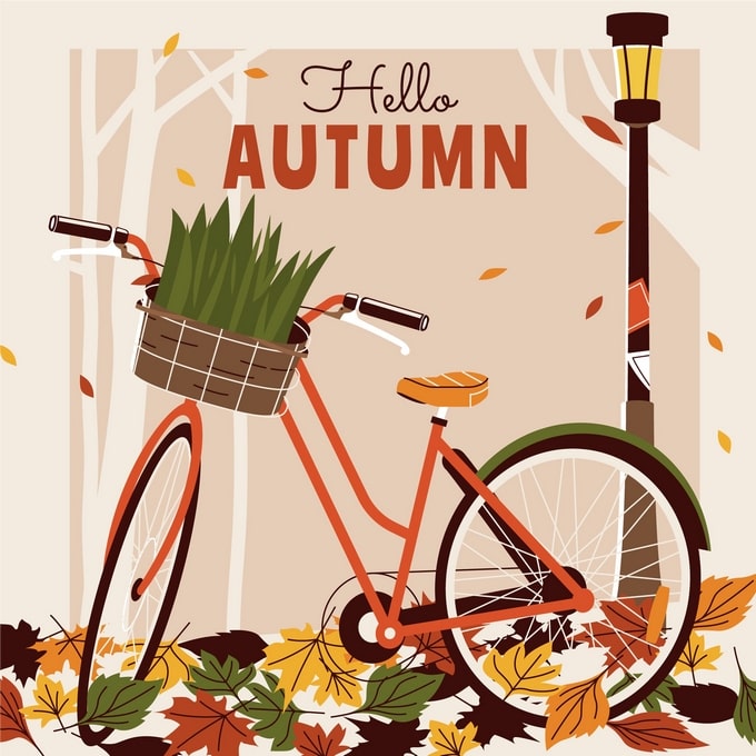 Rotes Fahrrad mit Graskorb und Schriftzug „Hallo Herbst“ zwischen fallenden Blättern