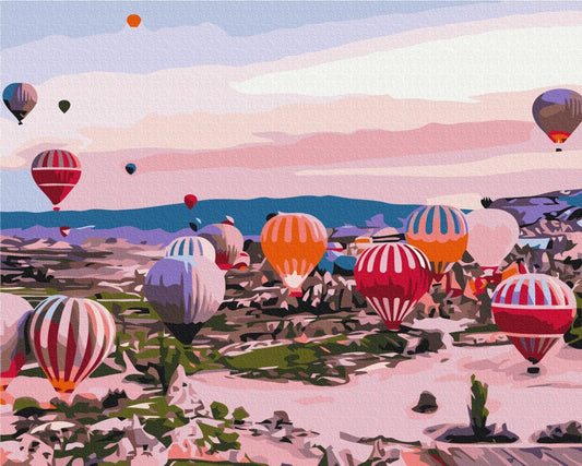 Colorful hot air balloons rising over Cappadocia's rock valleys at sunrise, paint-by-numbers canvas