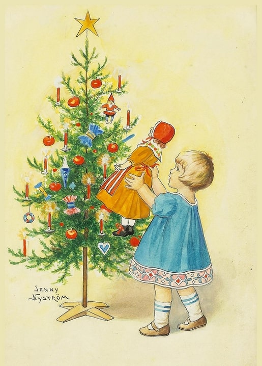 Child in a blue dress holding up a doll in an orange dress beside an elaborately decorated Christmas tree with candles and a gold star.