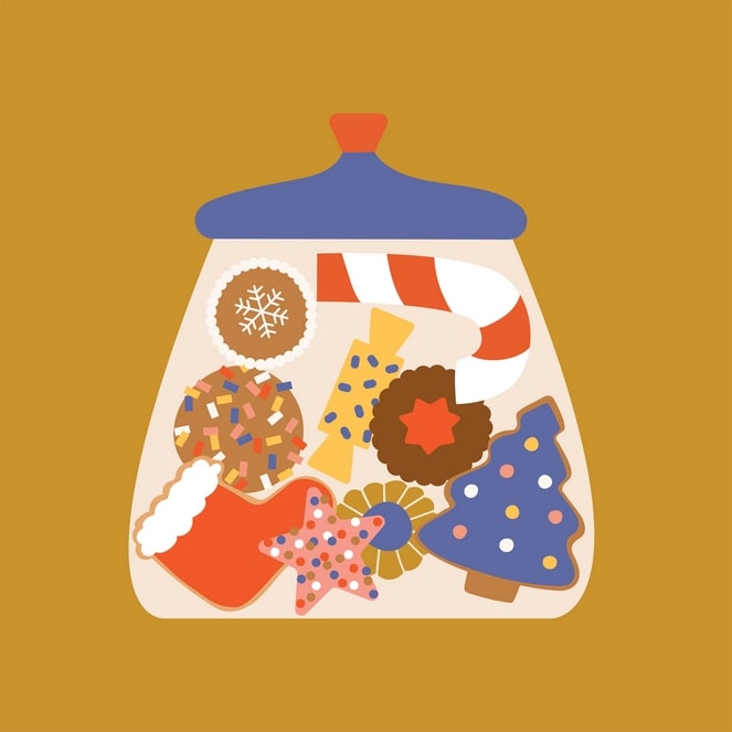 Glas mit Lebkuchen, Zuckerstange und sternförmigen Weihnachtsplätzchen