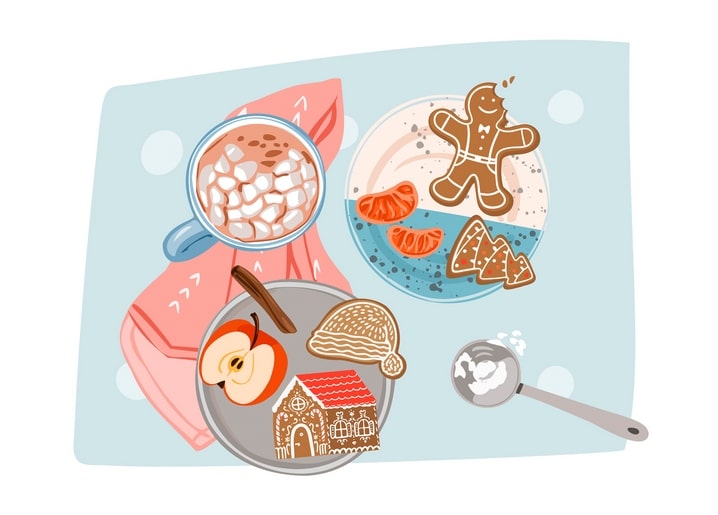Stillleben mit Kakao, Marshmallows, Lebkuchenmann und Mandarinenspalten