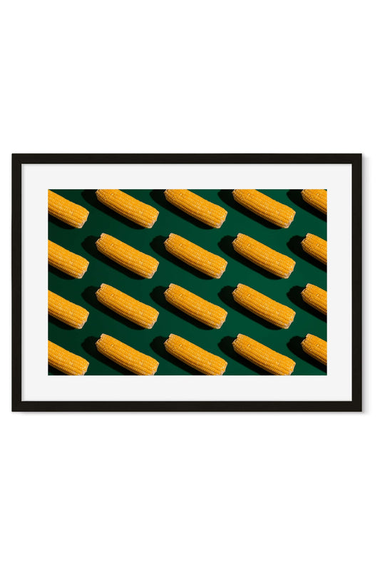 Repeating pattern of yellow corn cobs on a dark green background