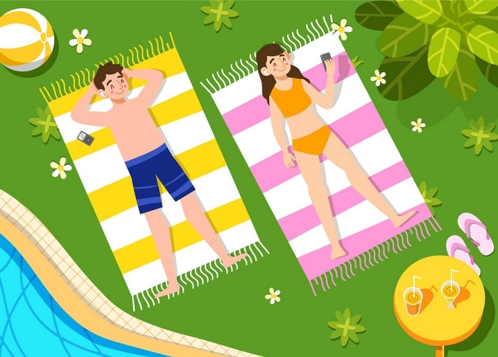 Man and woman relaxing on striped towels by a pool with a beach ball and drinks