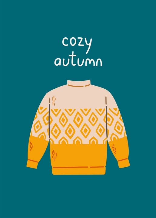 Cream and orange knit sweater with diamond pattern on deep teal background, 'cozy autumn' text