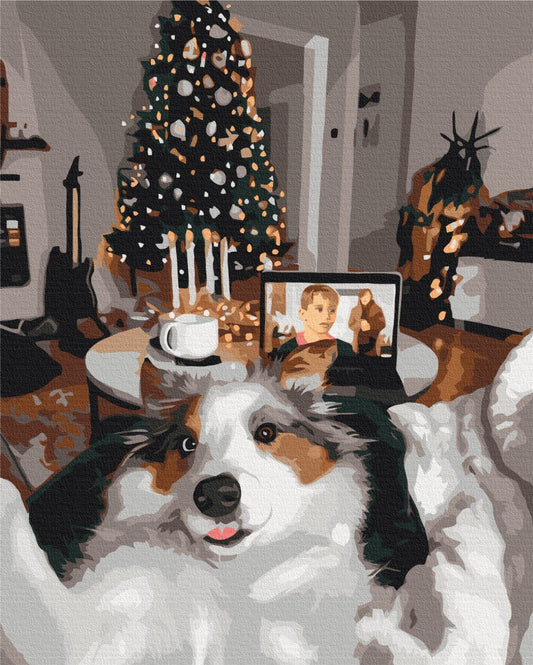 Dog wrapped in a blanket by the Christmas tree during a video call, design by Oksana Vorobiy