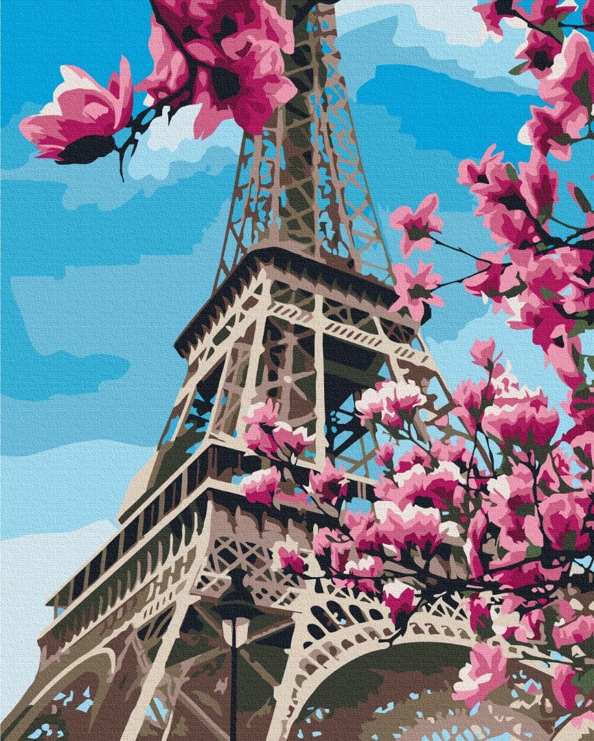 Close-up of the Eiffel Tower framed by blooming pink magnolia branches, paint-by-numbers art