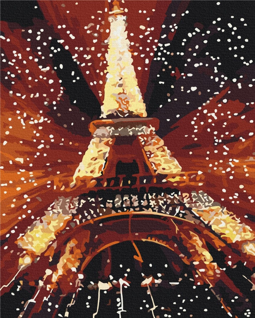 Eiffel Tower glowing gold at night with sparkling white light against a dark Paris sky