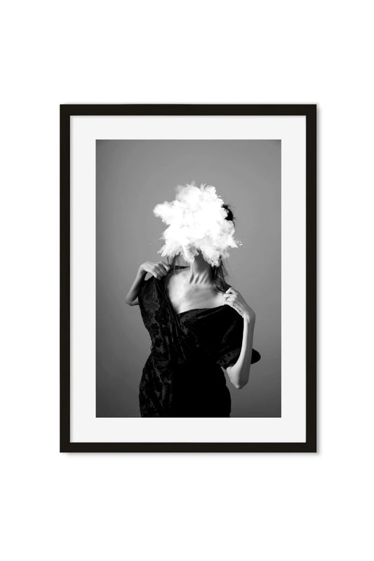 Black-and-white portrait of a woman in velvet, her face replaced by a burst of white cloud