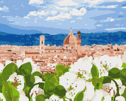 Paint-by-numbers view of Florence's Duomo behind white spring blossoms and terracotta rooftops