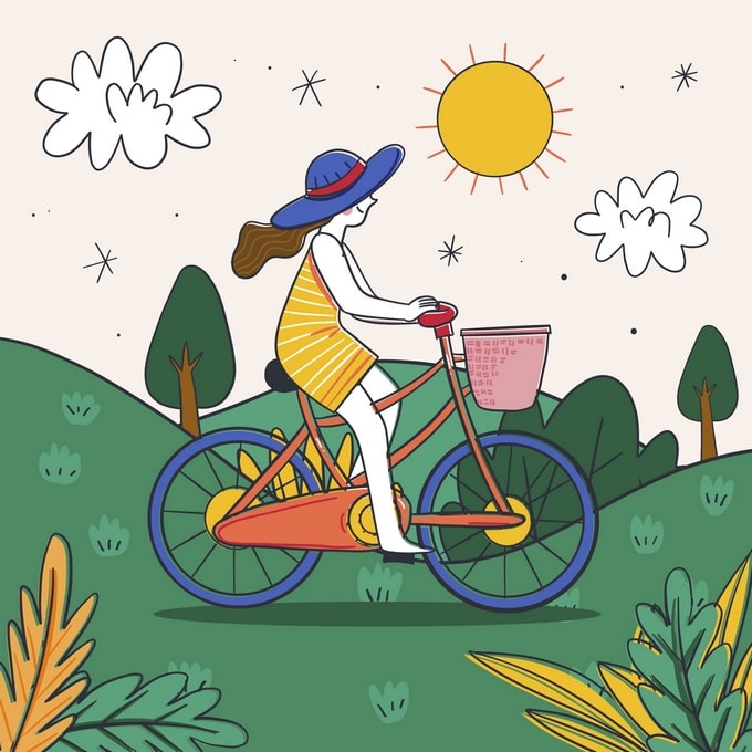 Girl in a sun hat riding a flower-decorated bicycle through green hills