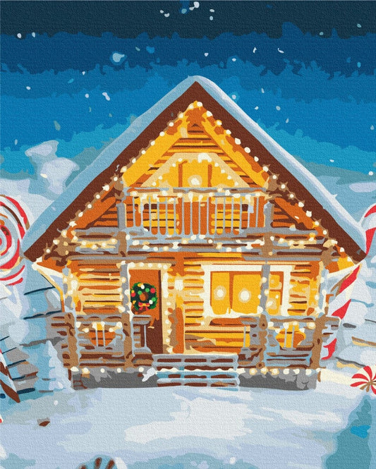 Malen-nach-Zahlen-Motiv eines erleuchteten Blockhauses im Schnee mit riesigen Zuckerstangen