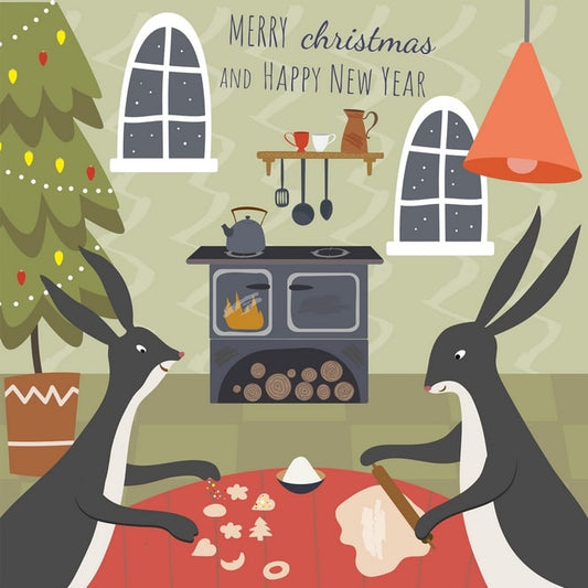 Two illustrated hares baking Christmas cookies by a wood stove