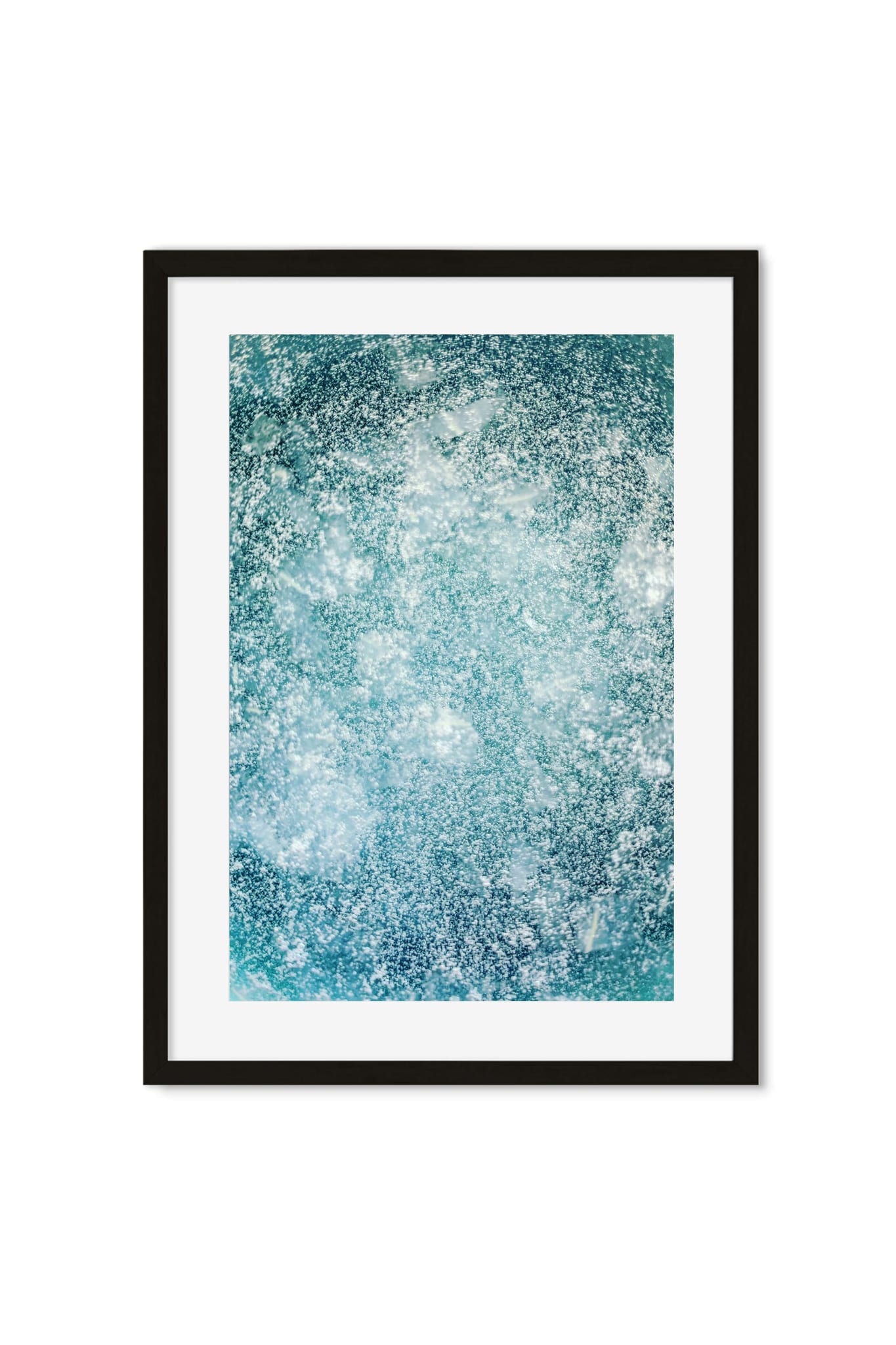 Abstract close-up of an icy blue and white speckled, frosted texture