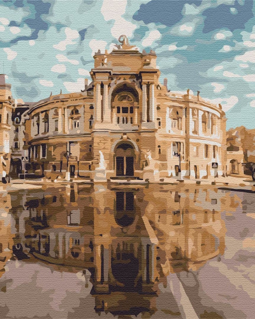 Paint-by-numbers scene of the Odesa Opera House reflected in a rain puddle under a cloudy blue sky