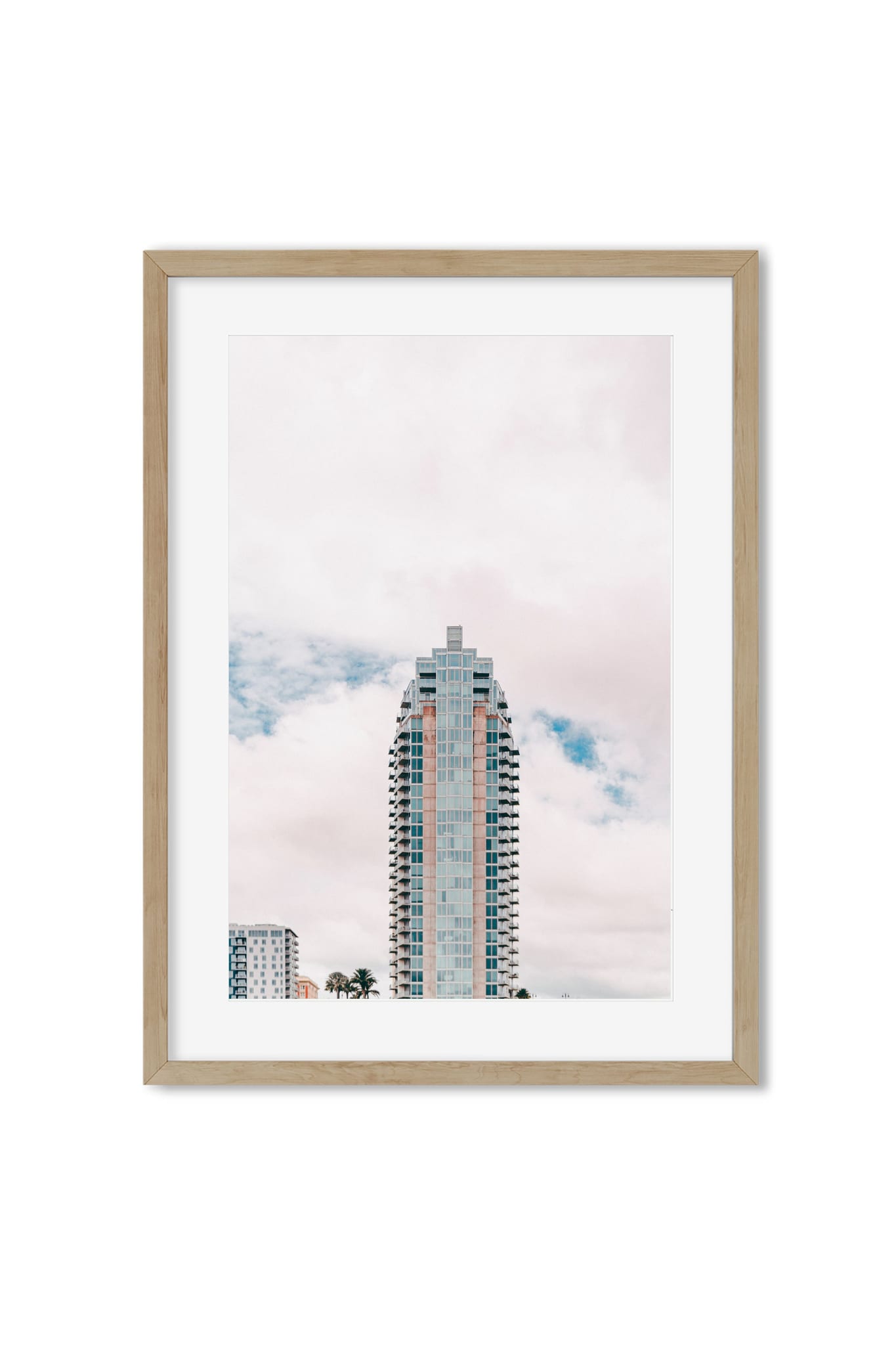 Pastel-colored high-rise building with palm trees against a cloudy sky, poster