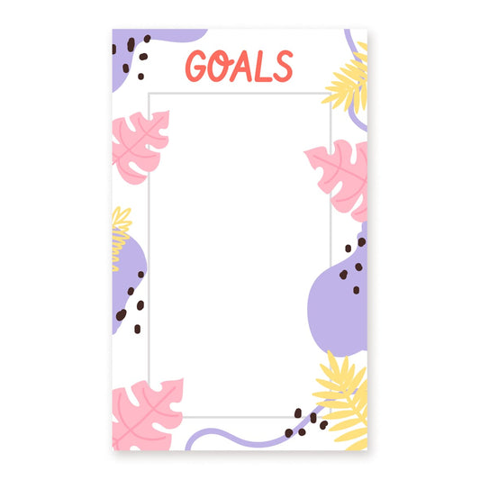 Leeres „GOALS“-Blatt umrahmt von rosa, lila und gelben Tropenblatt-Illustrationen