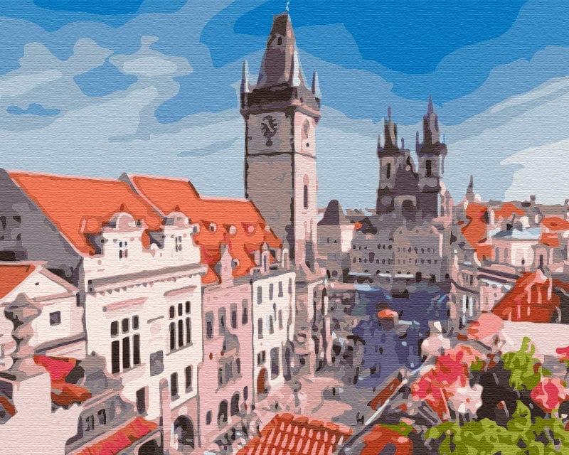 Prague rooftop view with the Astronomical Clock tower, Týn Church spires and red-tiled roofs
