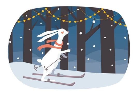 White rabbit skiing through a moonlit forest strung with lights, red scarf trailing behind