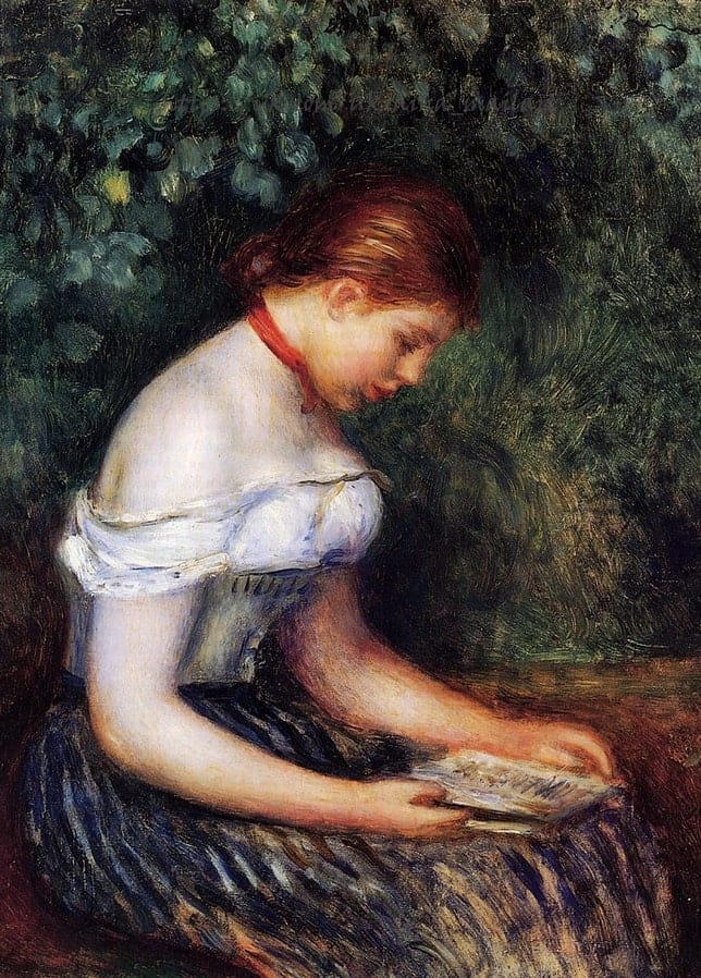 Renoir's painting of a red-haired woman absorbed in a book outdoors, dark green foliage behind her