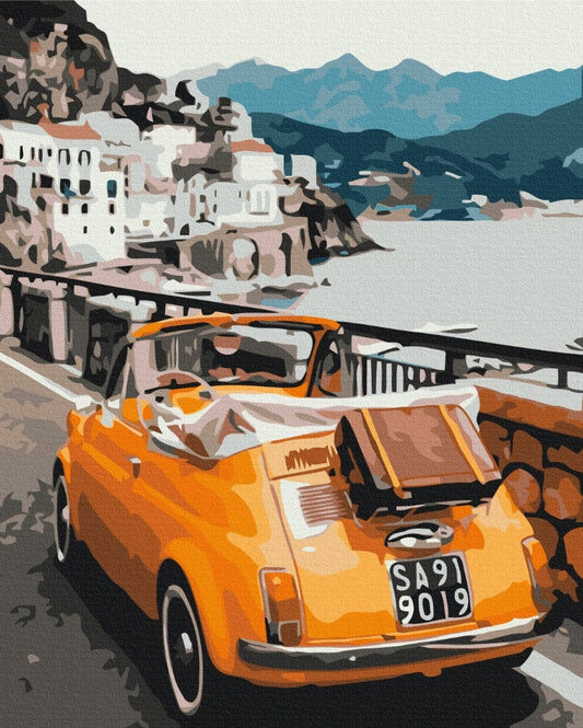 Orange retro convertible parked above the Amalfi Coast with a cliffside village and sea below, paint-by-number design