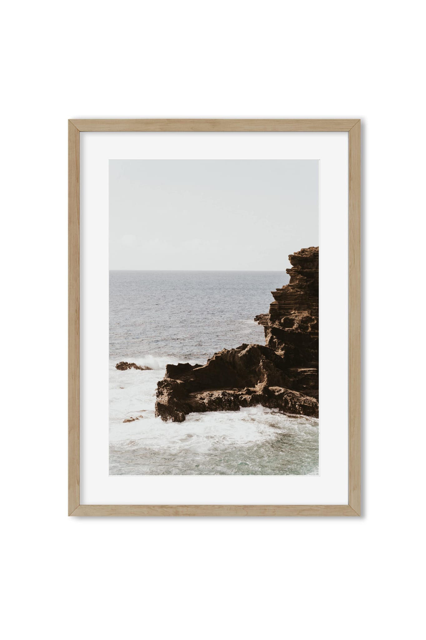 Poster of a brown rocky cliff and ocean waves under an overcast sky