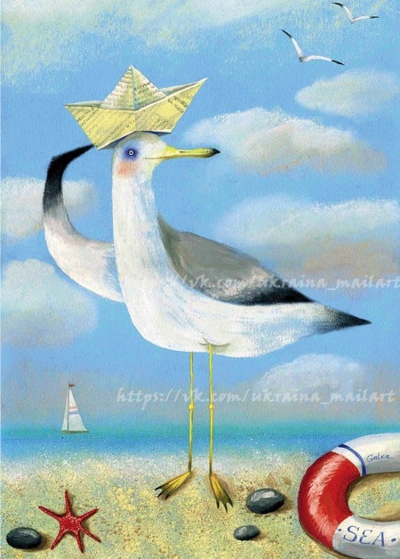 Two seagulls on a beach, one wearing a folded paper sailor hat, near a life buoy and a red starfish