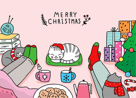 Two cats asleep in Christmas stockings under a tree, surrounded by cookies, cocoa and wrapped gifts