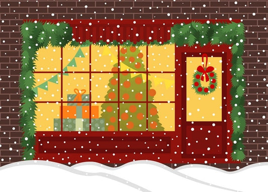 Snowy brick storefront with a wreathed door, garlands, and a lit Christmas tree in the window