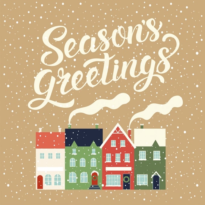 Row of snow-covered houses with chimney smoke and “Season's Greetings” lettering on kraft-brown background