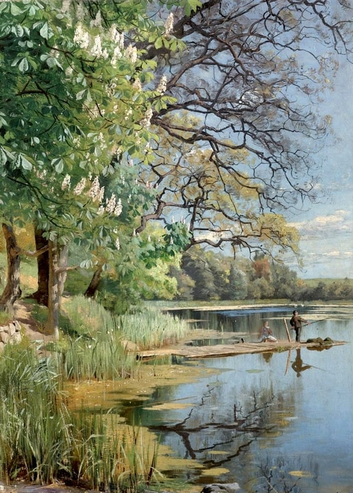 Blossoming horse-chestnut trees and a bare oak reflected in a still Danish lake with two anglers fishing from a jetty