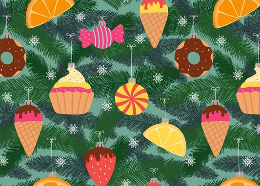 Illustrated Christmas ornaments shaped like donuts, cupcakes, ice cream cones and candy hanging on pine branches