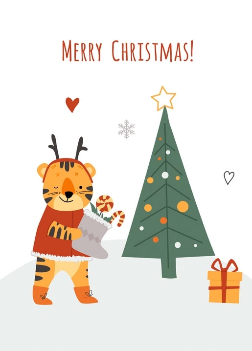 Tigerjunges mit Rentiergeweih hält einen Zuckerstangen-Stiefel neben Weihnachtsbaum und Geschenk