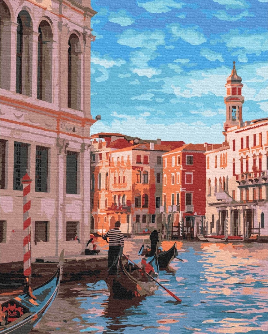 Gondolier poling gondolas along a narrow Venice canal past pink and ochre palazzo facades