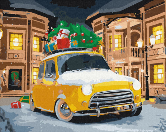 Motiv für Malen nach Zahlen: verschneiter Oldtimer mit Weihnachtsbaum auf dem Dach in Nachtstraße
