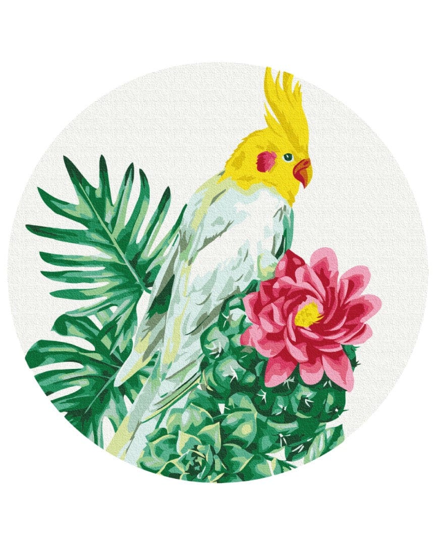 Yellow cockatiel perched on a blooming cactus with palm leaves